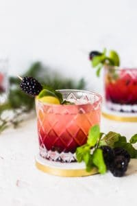 Blackberry Mint Cocktail are refreshing, crisp, tart and sweet. The perfect holiday pairing with Blackberry Goat Cheese Mini Toasts. #drink #cocktails #appetizer #goatcheese #mint