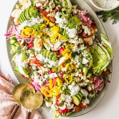 Chicken Cobb salad on a serving plate.