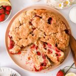 Fresh strawberry cake on a plate.