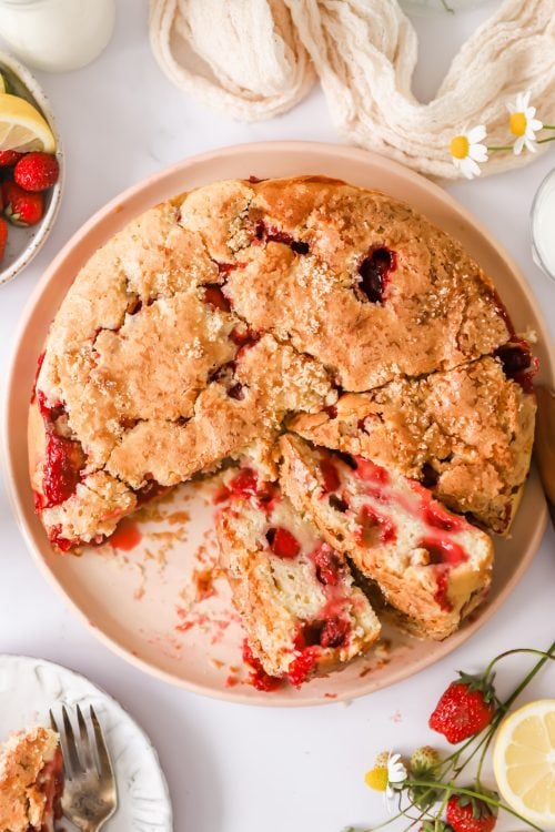 Fresh strawberry cake on a plate.