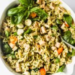 Chicken pesto pasta salad in a bowl.