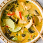 Tom kha soup in a bowl.