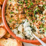 Spoonful of crab spinach artichoke dip.