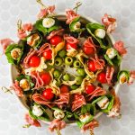 Antipasto skewers on a platter.