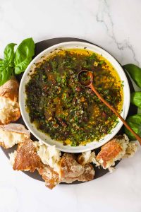 Bread dipping oil on a platter.
