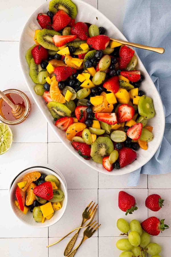 Freshly made honey lime fruit salad ready to be served.